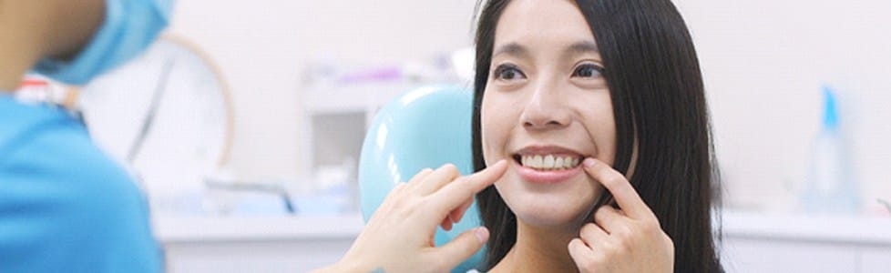 Smiling woman at dentist’s
