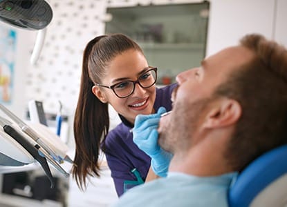 Man receiving dental exam